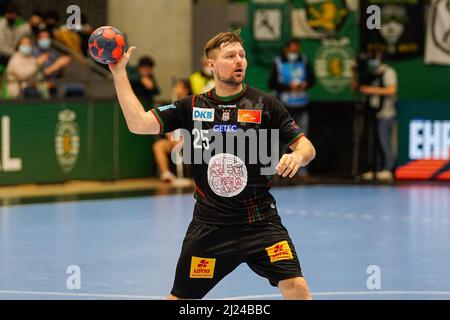 Lissabon, Portugal. 29. März 2022. Marko Bezjak aus Magdeburg beim Handball-Spiel der letzten 16 EHF-Europaliga zwischen Sporting CP und SC Magdeburg in Pavilhão João Rocha in Aktion gesehen.Endstand; Sporting CP 29:29 SC Magdeburg. Kredit: SOPA Images Limited/Alamy Live Nachrichten Stockfoto