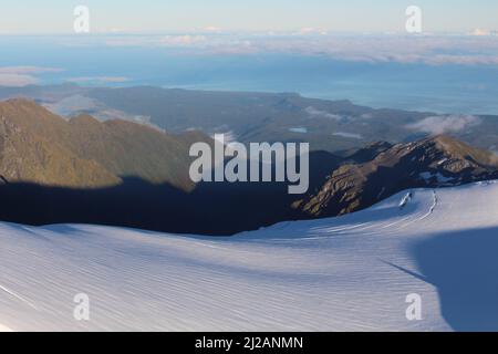 Hubschrauberflug über den Fox Glacier, Neuseelands Südinsel Stockfoto