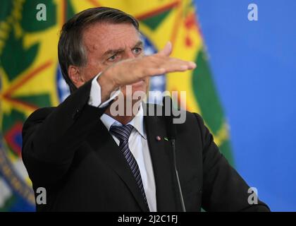 Brasilia, Brasilien. 31. März 2022. DF - Brasilia - 03/31/2022 - BRASILIA, EINRICHTUNG UND VERABSCHIEDUNG DER STAATSMINISTER - der Präsident der Republik, Jair Bolsonaro, während des Hochfestes der Einweihung und Verabschiedung der Staatsminister am Donnerstag, dem 31. März. Foto: Mateus Bonomi/AGIF/Sipa USA Quelle: SIPA USA/Alamy Live News Stockfoto