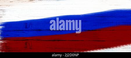 Das Konzept der ukrainischen Flagge auf einem weißen Holzhintergrund. Stockfoto