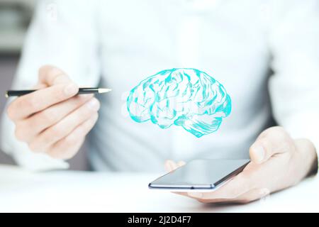 Mann Hand hält Telefon mit Gehirn auf weißem Hintergrund Stockfoto