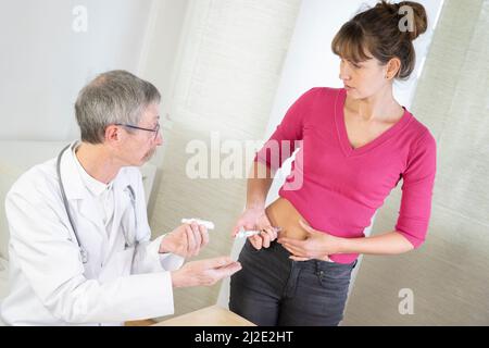 Diabetische Frau mit Arzt Stockfoto