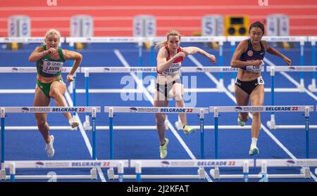 Sarah Lavin, Mathilde Heltbech und Lai Yiu Lui treten am zweiten Tag der Leichtathletik-Hallenweltmeisterschaften Belgrad 20 bei den 60m Hürden der Frauen an Stockfoto