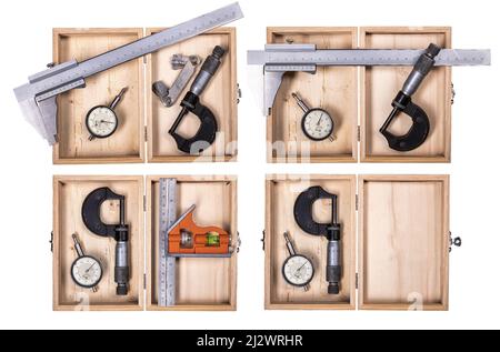Ein kleiner Schraubstock, der in einer Modellierwerkstatt verwendet wird. Isolierter Hintergrund. Stockfoto
