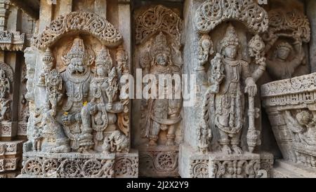 Skulptur von Lord Sri Lakshimi Narasimha Swamy und Lord Vishnu an der Wand des Lakshminarsimha Temple, Javagal, Hassan, Karnataka, Indien Stockfoto