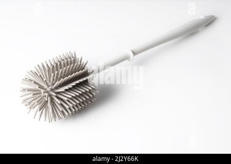 Moderne Toilettenbürste mit Silikonborsten Stockfoto