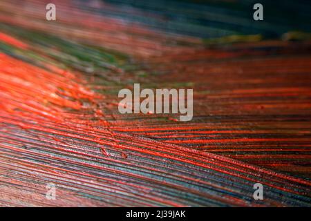 Selektiver Fokus der Malstriche. Abstrakter, farbenfroher Hintergrund. Nahaufnahme von gemischten Pinselstrichen. Abstrakte Tinte Design Vorlage gemischte Textur Hintergrund. Mischung aus verschiedenen Farbpaletten. Stockfoto