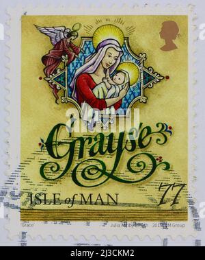 Foto einer gebrauchten Isle of man Christmas 2015 Briefmarke, herausgegeben zum 250.. Jahrestag der Veröffentlichung eines Manx-Gälischen Gebetsbuches Grayse Means Grace Stockfoto