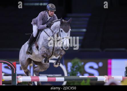 Leipzig, Deutschland. 07. April 2022. Christian Kukut aus Deutschland tritt auf der Leipziger Messe im Finale des Longines Fei Jumping World Cup 1. mit Checker an. Quelle: Jan Woitas/dpa/Alamy Live News Stockfoto