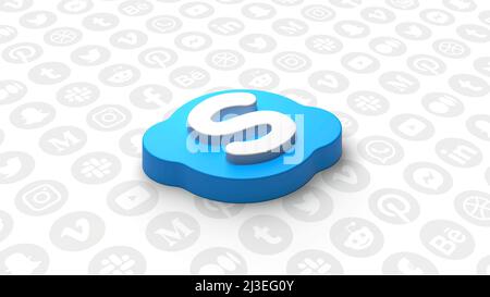 Abstraktes skype-Symbol, das aus vielen kleinen runden Partikeln mit Social-Media-Symbolen gebildet wird, die dahinter fließen. Bewegung. Konzept der Online-Dienste. Für redaktionelle Zwecke Stockfoto