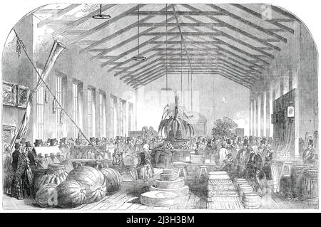 Provincial Industrial Exhibition of Canada, in Montreal - The South Hall, 1850. Anzeige '...hauptsächlich landwirtschaftlichen Erzeugnissen und Maschinen gewidmet...Hier sind Bündeln von Weizen, Gerste, Hafer, Erbsen und Bohnen, Im Stroh; sowie große Mengen dieser Körner in Säcken; feine Stücke von indischem Mais; Mehlfässer, Butterfässer, Perllaschen; Barrel Rindfleisch, Schweinefleisch und Schinken; Päckchen mit Hopfen, Käse, Honig, Stärke, Bienenwachs, Zucker...das Zentrum der Halle wird der Gartenbaugesellschaft gegeben und ist von einem achteckigen Stand besetzt...'. Aus „Illustrated London News“, 18 Stockfoto