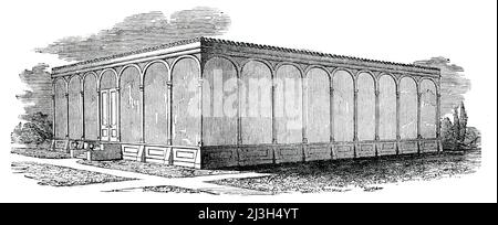 The New Victoria Regia House - Exterior, Chatsworth House, Derbyshire, 1850.Ein Vortrag wurde an der Society of Arts in London gehalten "...von Herrn Paxton aus Chatsworth, dem Designer des Industriepalastes, der jetzt im Hyde-Park aufsteigt, über die Entstehung und die Bauweise dieses Gebäudes...das neue Victoria Regia House, Das präsentiert eine leichte und neuartige Erscheinung, ist 60 Fuß 6 Zoll in der Länge und 46 Fuß 9 Zoll in der Breite. Obwohl das Victoria House im Vergleich zum Great Industrial Building eine sehr kleine Struktur ist, sind die Prinzipien, auf denen es gebaut wird, die gleichen und ma Stockfoto