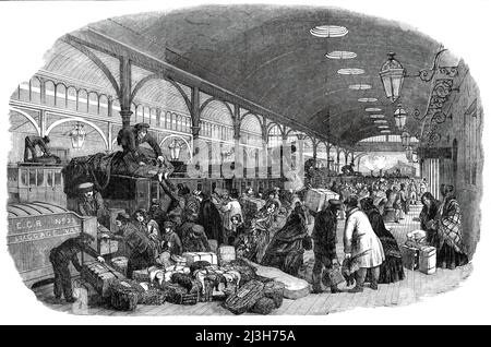 Ankunft des Weihnachtszuges, Eastern Counties Railway - gezeichnet von Duncan, 1850. Träger laden Weihnachtspakete an einer Station aus. Illustration zu einem Gedicht von D. ist der Zug angekommen?...siehst du nicht, dass er es hat? Was sonst noch der Verkehr und der Streit zwingt?... diese unzähligen Enten und Gänse, diese faasants, Truthähne - Prophezeiungen, der kommenden Krankenhausaufenthalte? Dieser Zug, wie eine Truhe, so titanisch in der Größe, ist ein Schrein, der Geschenke für einfache und Weise hält...dort werden Kasten und Bandbox, und Korb und alles, gegrouscht werden ... von groß und von klein - von Peter und Thomas, von Philip und Paul ... groß A Stockfoto