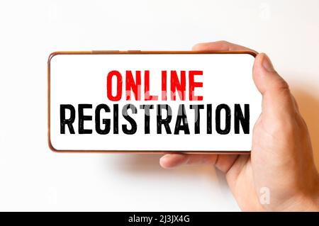 Online Registrierung auf dem Papier auf dem Schreibtisch isoliert. Business und Inspiration Konzept Stockfoto