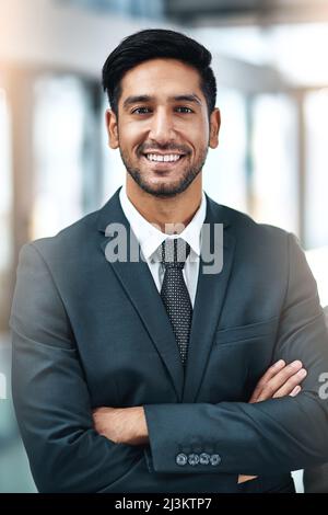 Finden Sie etwas, das Ihnen gefällt, und tun Sie es. Aufnahme von Geschäftsleuten im Büro. Stockfoto