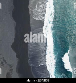 plage de sable noire Stockfoto
