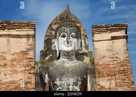 Gesicht des stehenden Buddha im Wat Mahathat in Sukhothai, Thailand. Stockfoto