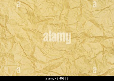 Textur Hintergrund von zerknittertem goldenem Bastelpapier Stockfoto