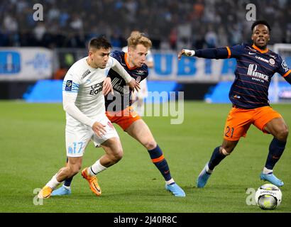 Cengiz unter von Marseille, Nicolas Cozza von Montpellier während der französischen Meisterschaft Ligue 1 Fußballspiel zwischen Olympique de Marseille (OM) und Montpellier HSC (MHSC) am 10. April 2022 im Stade Velodrome in Marseille, Frankreich - Foto Jean Catuffe / DPPI Stockfoto