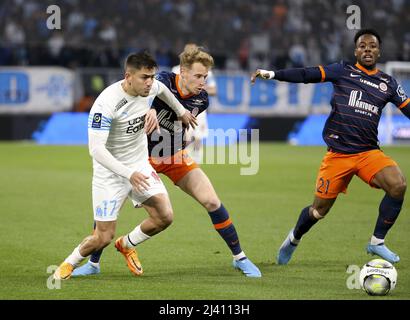 Cengiz unter von Marseille, Nicolas Cozza von Montpellier während des Fußballspiels der französischen Ligue 1 zwischen Olympique de Marseille (OM) und Montpellier HSC (MHSC) am 10. April 2022 im Stade Velodrome in Marseille, Frankreich - Foto: Jean Catuffe/DPPI/LiveMedia Stockfoto