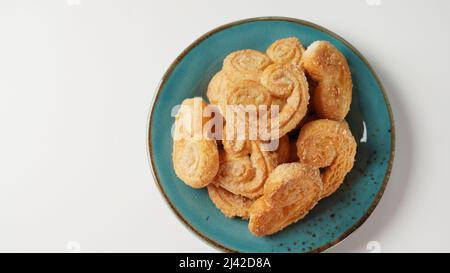 Palmier Biscuits - französische Kekse aus Blätterteig, auch Palmblätter, Elefantenohren oder französische Herzen genannt Stockfoto
