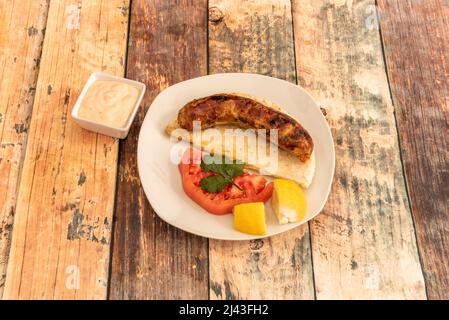 Der kreolische Chorizo zeichnet sich durch seine Mischung aus Schwein und Rind aus. Es unterscheidet sich von Chorizo aufgrund seiner Erscheinung und Geschmack, da es nicht conta Stockfoto