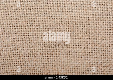 Sackleinen, brauner körniger Baumwolltuchhintergrund Stockfoto