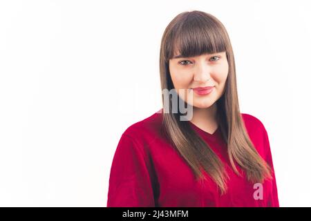 Porträt von attraktiven jungen europäischen Frau lächelnd, weißen Hintergrund isoliert Kopie Raum Studio aufgenommen . Hochwertige Fotos Stockfoto