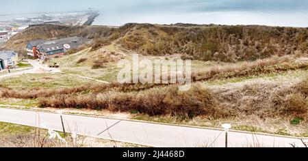 Helgoland, Deutschland. 26. März 2022. Die ehemalige markante Südspitze von Helgoland, ein Anflugpunkt für alle Schiffe, verschwand 1947 durch den 'Big Bäng' vollständig, und seither klafft an ihrer Stelle ein tiefer Krater. ( Zu dpa-Korr '6700 Tonnen Munitionsexplosion auf Helgoland - 75 Jahre 'Urknall'' am 12.04.2022) Quelle: Markus Scholz/dpa/Alamy Live News Stockfoto