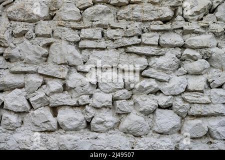 Weiß getünchten Stein Wand Texturen Hintergrund Stockfoto