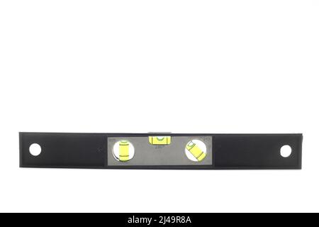 Metallisches Gebäude auf weißem Hintergrund. Messinstrument in rechteckiger Form aus Kunststoff mit transparenten Kolben in ihr Fille installiert Stockfoto