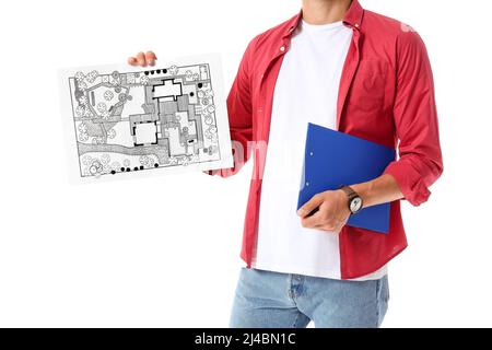 Junger männlicher Landschaftsdesigner mit neuem Projekt auf weißem Hintergrund Stockfoto
