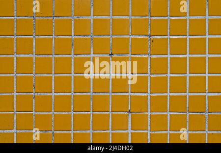 Alte gelbe Kachel Wand Textur Hintergrund Stockfoto