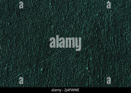 Grunge dunkelgrüner alter abstrakter Hintergrund im Vintage-Design mit poröser Textur, Kratzern und Linien. Die Kunst der groben stilisierten Textur. Stockfoto