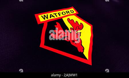 Abstrakt Watford Football Club Flagge mit einem roten Kopf eines Hirsches. Bewegung. Englischer Profifußballverein mit einem Logo, das im Wind schwankt, nahtlos Stockfoto