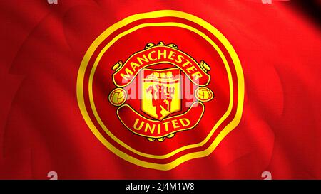 Das rote Emblem der Fußballmannschaft von Manchester United. Bewegung. Eine rote Leinwand für das gesamte Filmmaterial, in dessen Mitte das Symbol des Teams steht Stockfoto