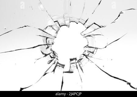 Risse von Kugeln im Glas isoliert auf weißem Hintergrund Stockfoto