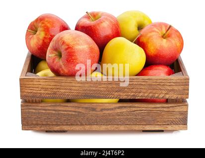 Äpfel in hölzernen Kasten Weg isoliert auf weiß Stockfoto