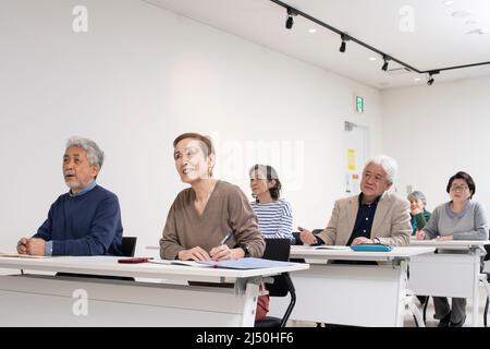 Senior am Seminar Stockfoto