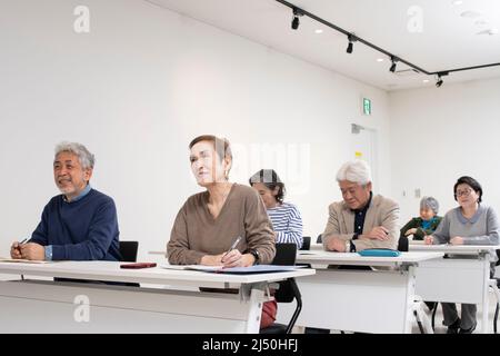 Senior am Seminar Stockfoto