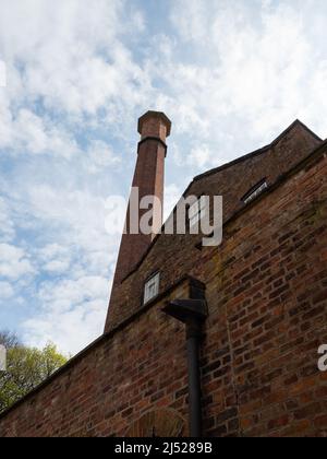 Styal Ches hire UK 17. April 2022 die Mühle am Steinbruch Bank und Schornstein Stockfoto