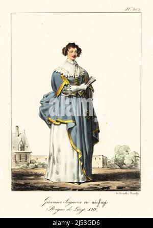 Junge französische Frau in legerem Kleid, Regierungszeit von König Louis XIII. Kleid mit goldenem Saum, großem Spitzenkragen, geschnürtem Oberteil, weißem Unterrock, Almosenbeutel. Jeune Dame en negzige. Regne de Louis XIII Handkolorierte Lithographie von Lorenzo Bianchi und Domenico Cuciniello nach Hippolyte Lecomte aus Costumi civili e militari della monarchia francese dal 1200 al 1820, Neapel, 1825. Italienische Ausgabe von Lecomtes zivilen und militärischen Kostümen der französischen Monarchie von 1200 bis 1820. Stockfoto