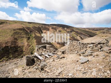 Die verunglückten Überreste der alten Bleibergbauindustrie in Gunnerside Gill, Swaledale, North Yorkshire, England, Großbritannien Stockfoto