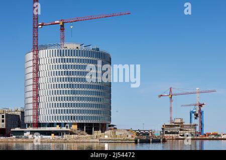 Bau des kreisförmigen Bürogebäudes „Spidsen“ in Nordø/Redmolen, Kopenhagen, Dänemark Stockfoto