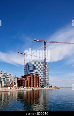 Bau des kreisförmigen Bürogebäudes „Spidsen“ in Nordø/Redmolen, Kopenhagen, Dänemark Stockfoto