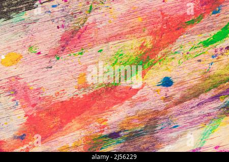 Alte schmutzige Holz Hintergrund mit Spritzern von heller Farbe. Farbenfrohe Grunge-Textur Stockfoto