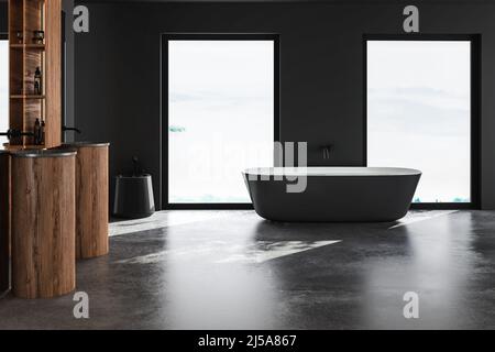 Wunderschöne schwarze Badewanne in der Mitte des dunkelgrauen Badezimmers und zwei Waschbecken. Minimalistisches Design des modernen Badezimmers. 3D Rendern Stockfoto