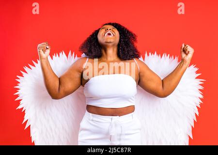 Frau Engel mit weißen Flügeln. Das Konzept des Erfolgs Stockfoto