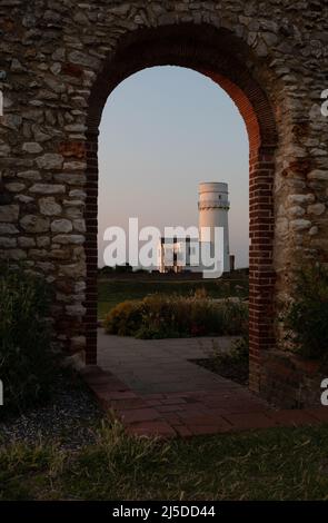 Der ikonische Leuchtturm in Old Hunstanton bei Sonnenuntergang. Stockfoto