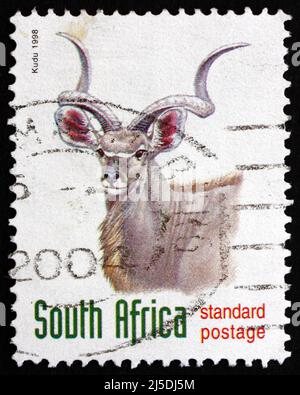 SÜDAFRIKA - UM 1998: Eine in Südafrika gedruckte Briefmarke zeigt Greater Kudu, Tragelaphus strepsiceros, Antelope, um 1998 Stockfoto